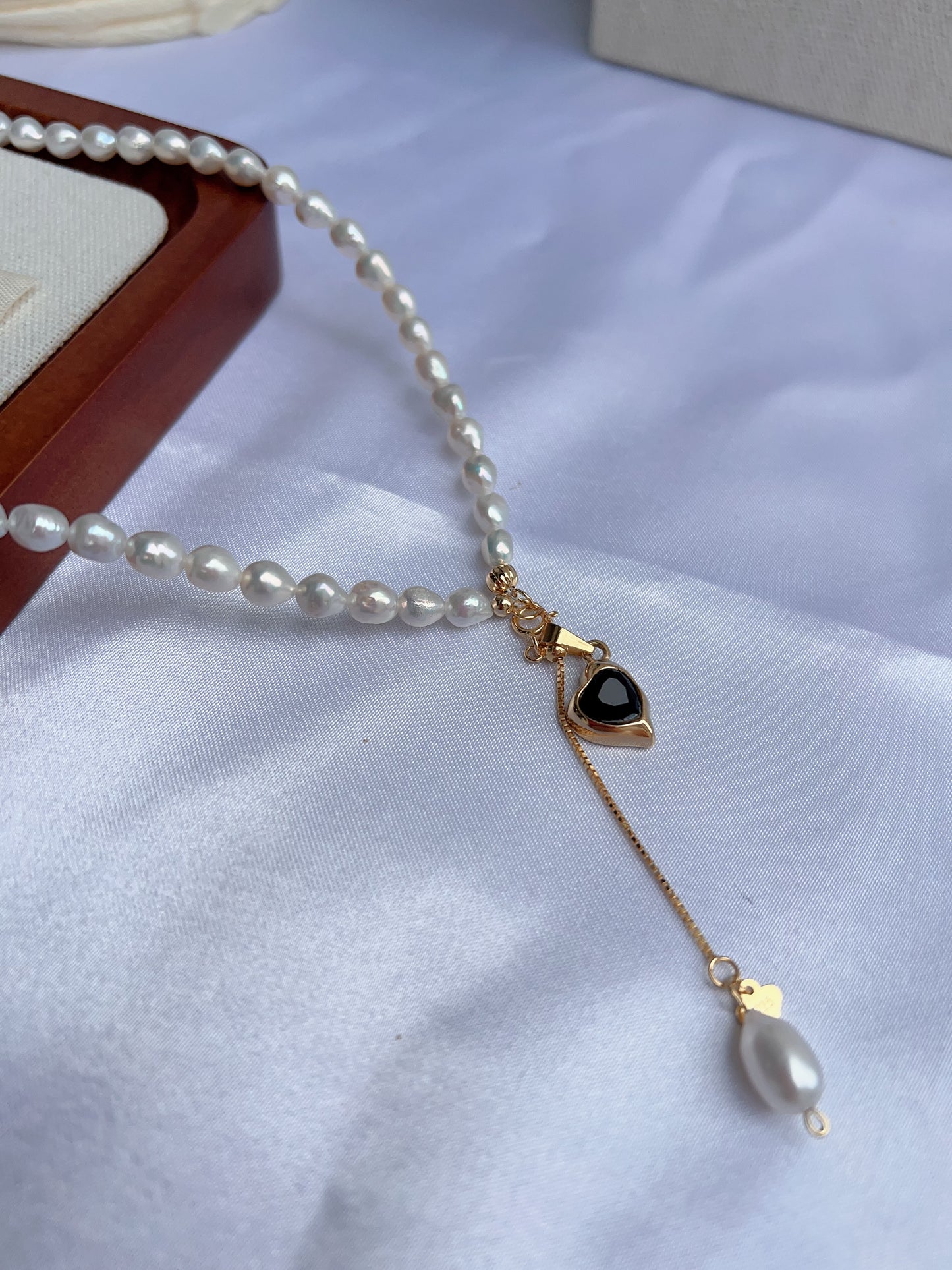 #PN1239 freshwater pearl necklace minimalist onyx lava heart pendant dangling pearl lustrous rice baroque pearl smooth surface coordinated shape