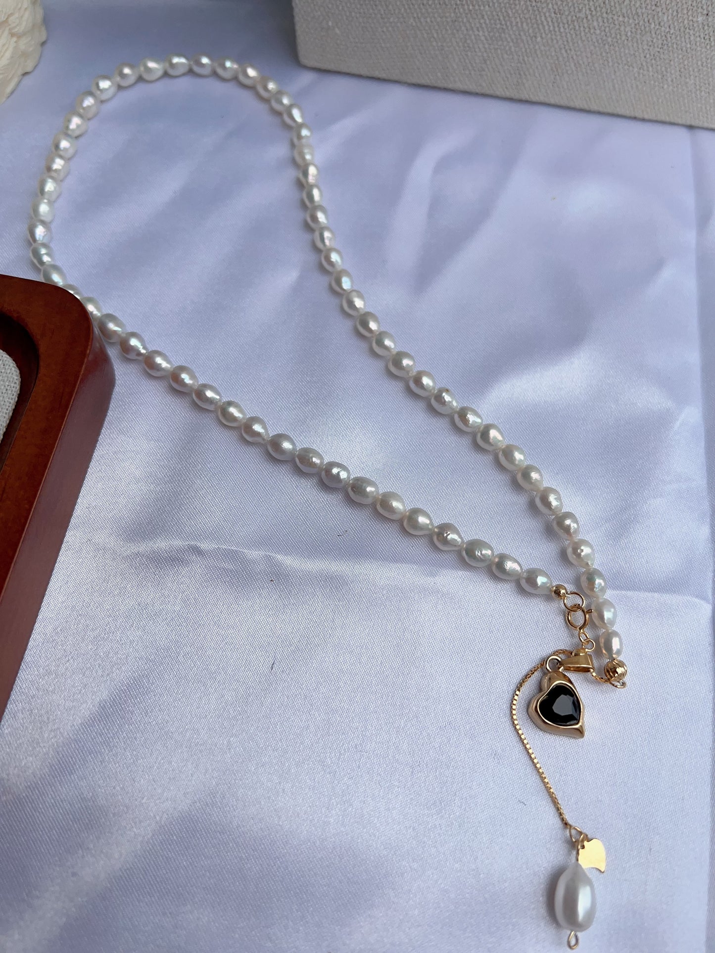 #PN1239 freshwater pearl necklace minimalist onyx lava heart pendant dangling pearl lustrous rice baroque pearl smooth surface coordinated shape